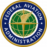 FAA emblem: circular seal with blue ring, gold border, globe and gold wing, reading 'Federal Aviation Administration'